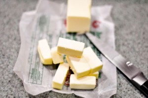 butter cubed with knife