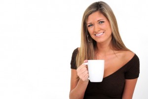 woman drinking cup of coffee